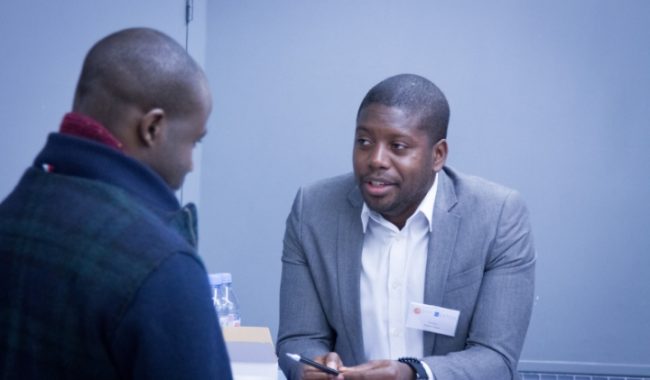 two people having a one on one conversation_business school interview