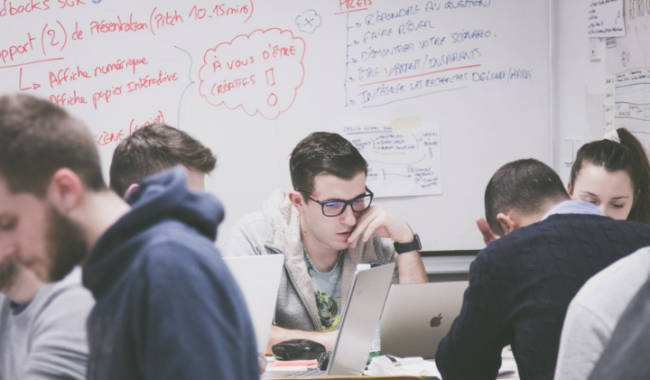 students in study room higher education