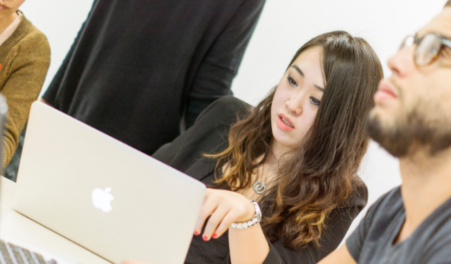EMLV student on her laptop