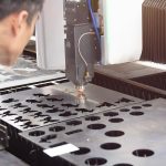 Worker,In,The,Industrial,Laser,Cutting,Of,Sheet,Metal.,Industry